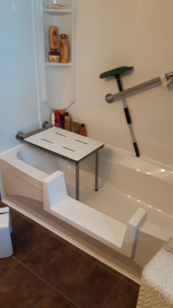 Accessible bathtub modification with side-entry cut and transfer bench