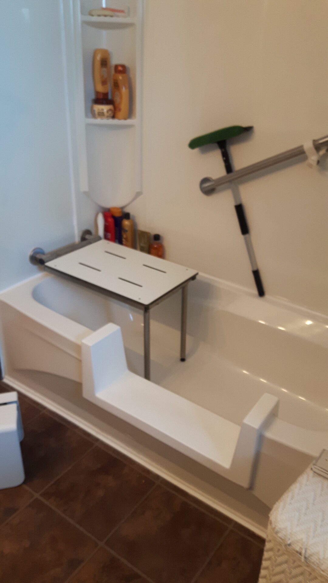 Accessible bathtub modification with side-entry cut and transfer bench