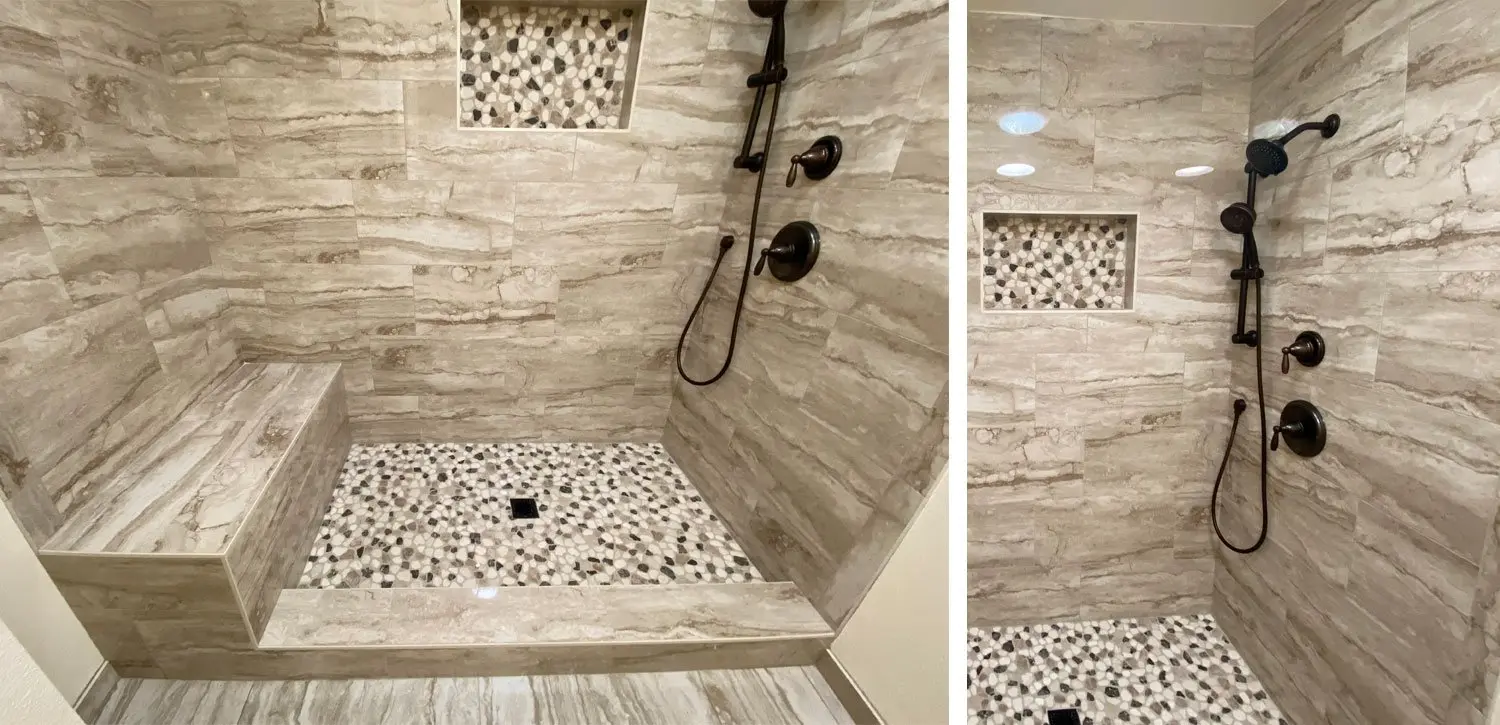 Walk-in shower with beige marble-look tile walls, built-in bench, mosaic tile floor, and oil-rubbed bronze fixtures