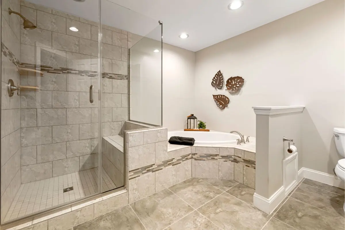 Traditional bathroom with walk-in tile shower and corner bathtub